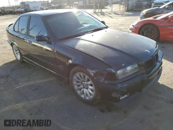 1998 BMW 3 Series M3s with VIN WBSCD932XWEE08919, listed as a Copart auction lot 84434704 with Not provided miles and Salvage title. Bid and sale history available at DreamBid. Image 4.