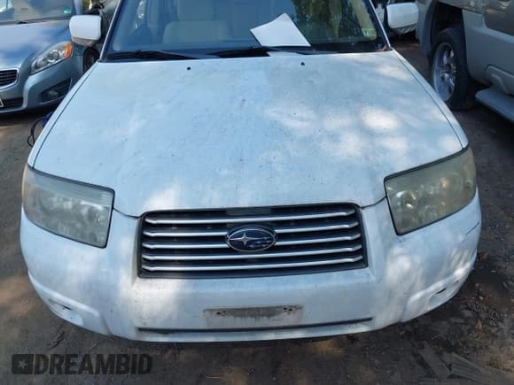 ✅ 2007 Subaru Forester X • VIN: JF1SG65607H703989 • Lot: 42787240. Listed on IAAI with 175,381 mi. Free auction sales archive from the USA and detailed vehicle history report at DreamBid. Image 6.