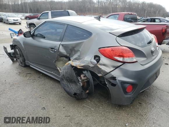 ✅ 2015 Hyundai Veloster Turbo • VIN: KMHTC6AE0FU221208 • Lot: 86242934. Listed on Copart with 118,982 mi. Free auction sales archive from the USA and detailed vehicle history report at DreamBid. Image 2.