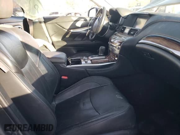 ✅ 2015 Infiniti Q70 • VIN: JN1BY1AP4FM542466 • Lot: 92323585. Wystawiony na Copart z przebiegiem 195 061 mil. Bezpłatny archiwum sprzedaży aukcyjnych z USA i szczegółowy raport historii pojazdu na DreamBid. Zdjęcie 7.