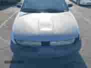 1998 Saturn SL z VIN 1G8ZF5284WZ303478, wystawiony jako IAAI lot #42946026 z przebiegiem 175 786 mil mil oraz . Historia ofert i sprzedaży dostępna na DreamBid. Obrazek 6.