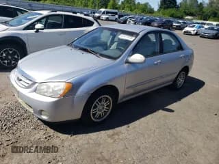 ✅ 2004 Kia Spectra LX • VIN: KNAFE121245008405 • Lot: 62411575. Listed on Copart with 120,803 mi. Free auction sales archive from the USA and detailed vehicle history report at DreamBid. Image 1.