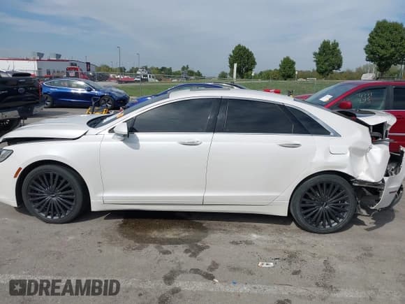 ✅ 2017 Lincoln MKZ Reserve • VIN: 3LN6L5E97HR645290 • Lot: 43342935. Wystawiony na IAAI z przebiegiem 58 476 mil. Bezpłatny archiwum sprzedaży aukcyjnych z USA i szczegółowy raport historii pojazdu na DreamBid. Zdjęcie 14.