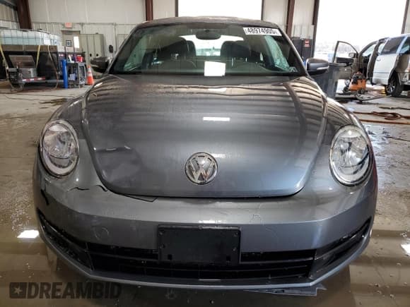 ✅ 2013 Volkswagen Beetle Fender Edition • VIN: 3VWJP7AT5DM679698 • Lot: 48974905. Listed on Copart with 89,437 mi. Free auction sales archive from the USA and detailed vehicle history report at DreamBid. Image 5.