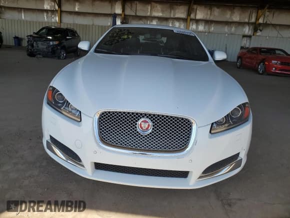 ✅ 2014 Jaguar XF SC • VIN: SAJWJ0EF4E8U30323 • Lot: 49080334. Listed on Copart with 69,546 mi. Free auction sales archive from the USA and detailed vehicle history report at DreamBid. Image 5.