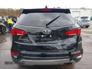 2017 Hyundai Santa Fe 2.4L z VIN 5XYZUDLB9HG415114, wystawiony jako IAAI lot #43533973 z przebiegiem 78 724 mil mil oraz . Historia ofert i sprzedaży dostępna na DreamBid. Obrazek 6.