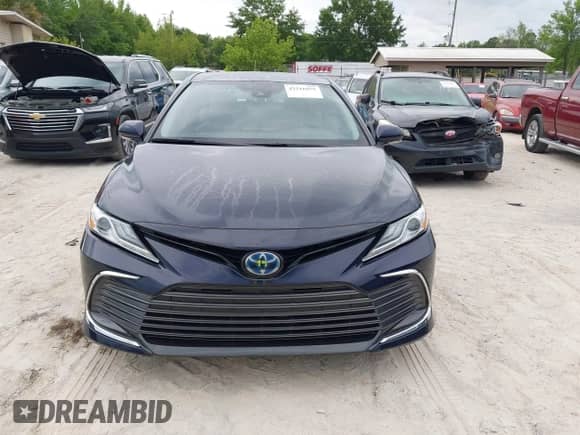 2022 Toyota Camry Hybrid XLE with VIN 4T1F31AK4NU591517, listed as a IAAI auction lot 42216959 with 36,048 mi miles and . Bid and sale history available at DreamBid. Image 12.