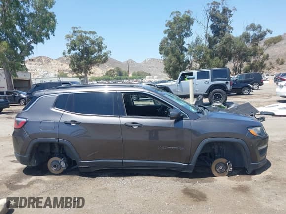 ✅ 2020 Jeep Compass Latitude • VIN: 3C4NJCBB9LT169802 • Lot: 42520373. Listed on IAAI with 107,704 mi. Free auction sales archive from the USA and detailed vehicle history report at DreamBid. Image 13.
