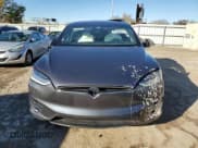 ✅ 2021 Tesla Model X Performance • VIN: 5YJXCBE44MF324718 • Lot: 81096074. Listed on Copart with 37,411 mi. Free auction sales archive from the USA and detailed vehicle history report at DreamBid. Image 5.