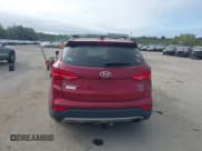 ✅ 2014 Hyundai Santa Fe • VIN: 5XYZUDLB4EG154146 • Lot: 43234913. Listed on IAAI with 184,050 mi. Free auction sales archive from the USA and detailed vehicle history report at DreamBid. Image 16.