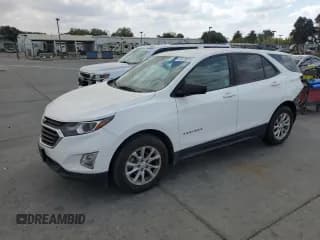 ✅ 2020 Chevrolet Equinox LS • VIN: 3GNAXFEV0LS688934 • Лот: 81239315. Опубликован ранее на Copart с пробегом 112 336 миль. Бесплатный доступ к архиву аукционных продаж из США и подробный отчёт об истории автомобиля на DreamBid. Изображение 1.