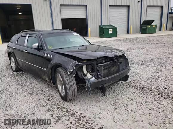 2005 Dodge Magnum RT z VIN 2D8GV58255H550673, wystawiony jako Copart lot #74340604 z przebiegiem 206 578 mil mil oraz Szkoda całkowita • Salvage title. Historia ofert i sprzedaży dostępna na DreamBid. Obrazek 11.