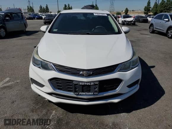 2018 Chevrolet Cruze LS z VIN 1G1BC5SM1J7180037, wystawiony jako Copart lot #71641325 z przebiegiem 143 272 mil mil oraz Szkoda całkowita • Salvage title. Historia ofert i sprzedaży dostępna na DreamBid. Obrazek 5.
