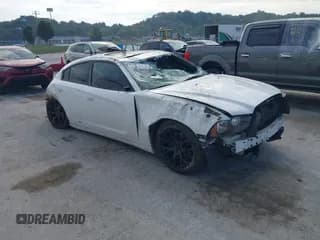 ✅ 2013 Dodge Charger SXT • VIN: 2C3CDXHGXDH525293 • Lot: 43358262. Listed on IAAI with 148,220 mi. Free auction sales archive from the USA and detailed vehicle history report at DreamBid. Image 1.