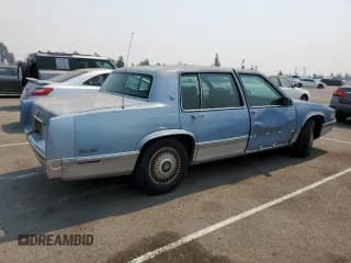 ✅ 1991 Cadillac DeVille • VIN: 1G6CD53B5M4241551 • Lot: 69949614. Listed on Copart with 179,189 mi. Free auction sales archive from the USA and detailed vehicle history report at DreamBid. Image 3.