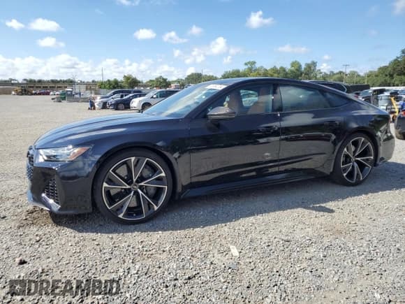 ✅ 2021 Audi RS 7 • VIN: WUAPCBF26MN909897 • Lot: 68984704. Wystawiony na Copart z przebiegiem 29 296 mil. Bezpłatny archiwum sprzedaży aukcyjnych z USA i szczegółowy raport historii pojazdu na DreamBid. Zdjęcie 1.