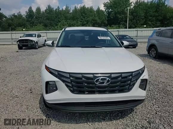 2022 Hyundai Tucson SEL z VIN 5NMJBCAE7NH158202, wystawiony jako Copart lot #68732365 z przebiegiem 43 605 mil mil oraz Szkoda całkowita • Salvage title. Historia ofert i sprzedaży dostępna na DreamBid. Obrazek 14.