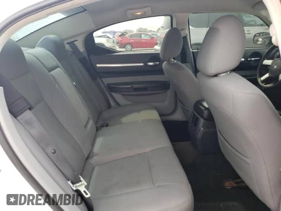 2008 Dodge Charger SXT с VIN 2B3KA33G18H214536, выставлен на аукционе Copart как лот 54944975 с пробегом 221 285 миль миль и Списание • Salvage title. История ставок и продаж доступна на DreamBid. Изображение 10.