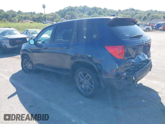 ✅ 2023 Honda Passport EX-L • VIN: 5FNYF8H57PB017891 • Lot: 43327862. Listed on IAAI with 61,839 mi. Free auction sales archive from the USA and detailed vehicle history report at DreamBid. Image 3.