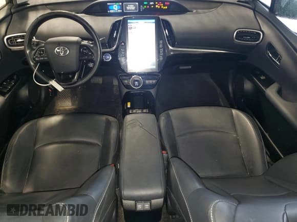 ✅ 2021 Toyota Prius XLE • VIN: JTDKAMFP6M3174970 • Lot: 85478855. Listed on Copart with 69,387 mi. Free auction sales archive from the USA and detailed vehicle history report at DreamBid. Image 8.