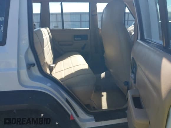 ✅ 1995 Jeep Cherokee Sport • VIN: 1J4FJ68S1SL576255 • Lot: 42178902. Listed on IAAI with 214,041 mi. Free auction sales archive from the USA and detailed vehicle history report at DreamBid. Image 8.