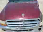 2000 Dodge Dakota Sport z VIN 1B7GG26N5YS546673, wystawiony jako Copart lot #54512715 z przebiegiem 140 904 mil mil oraz Czysty tytuł • Clean title. Historia ofert i sprzedaży dostępna na DreamBid. Obrazek 11.