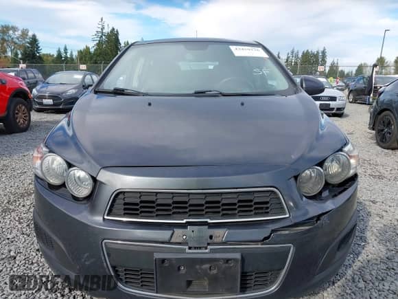 2013 Chevrolet Sonic LT with VIN 1G1JC6SG2D4148084, listed as a IAAI auction lot 43459236 with 94,963 mi miles and . Bid and sale history available at DreamBid. Image 12.