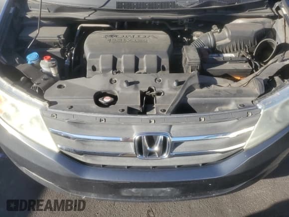 ✅ 2013 Honda Odyssey LX • VIN: 5FNRL5H20DB039065 • Лот: 85134445. Опубликован ранее на Copart с пробегом 165 751 миль. Бесплатный доступ к архиву аукционных продаж из США и подробный отчёт об истории автомобиля на DreamBid. Изображение 12.