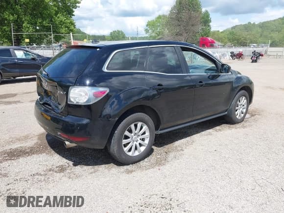 ✅ 2012 Mazda CX-7 i Touring • VIN: JM3ER2CM5C0415574 • Lot: 42263702. Wystawiony na IAAI z przebiegiem 293 566 mil. Bezpłatny archiwum sprzedaży aukcyjnych z USA i szczegółowy raport historii pojazdu na DreamBid. Zdjęcie 4.