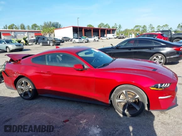 ✅ 2020 Ford Mustang EcoBoost • VIN: 1FA6P8TH8L5167063 • Lot: 42659677. Listed on IAAI with 62,897 mi. Free auction sales archive from the USA and detailed vehicle history report at DreamBid. Image 13.