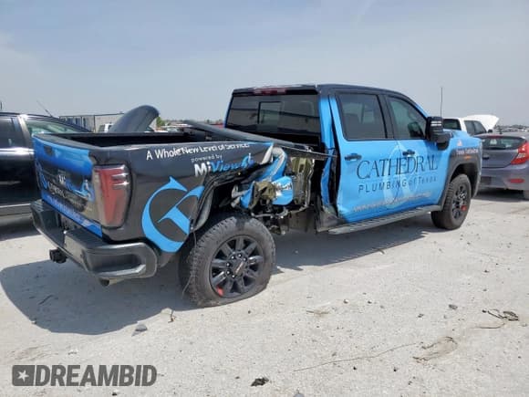 ✅ 2024 GMC Sierra 3500HD AT4 • VIN: 1GT49VEY3RF258610 • Lot: 50641105. Listed on Copart with 49,115 mi. Free auction sales archive from the USA and detailed vehicle history report at DreamBid. Image 3.