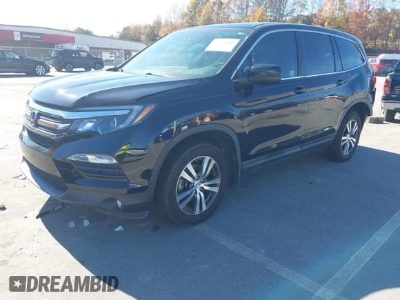 ✅ 2017 Honda Pilot EX-L • VIN: 5FNYF6H51HB033722 • Lot: 43594503. Listed on IAAI with 146,016 mi. Free auction sales archive from the USA and detailed vehicle history report at DreamBid. Image 2.