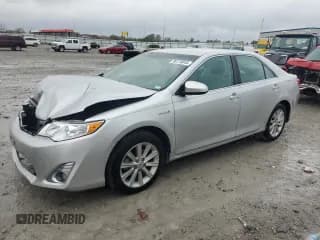 ✅ 2012 Toyota Camry XLE • VIN: 4T1BD1FK7CU034585 • Lot: 90116045. Listed on Copart with 70,097 mi. Free auction sales archive from the USA and detailed vehicle history report at DreamBid. Image 1.