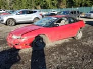 ✅ 1999 Saturn SC • VIN: 1G8ZN1283XZ283513 • Лот: 41760055. Опубликован ранее на Copart с пробегом Не указан. Бесплатный доступ к архиву аукционных продаж из США и подробный отчёт об истории автомобиля на DreamBid. Изображение 1.