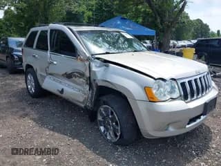 ✅ 2009 Jeep Grand Cherokee • VIN: 1J8HR68T09C523470 • Lot: 42764630. Listed on IAAI with 131,376 mi. Free auction sales archive from the USA and detailed vehicle history report at DreamBid. Image 1.