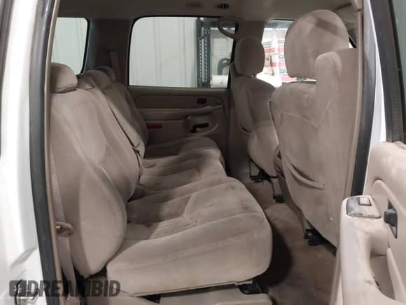 2005 Chevrolet Suburban LS z VIN 1GNFK16Z45J176719, wystawiony jako IAAI lot #42325067 z przebiegiem 199 884 mil mil oraz . Historia ofert i sprzedaży dostępna na DreamBid. Obrazek 8.