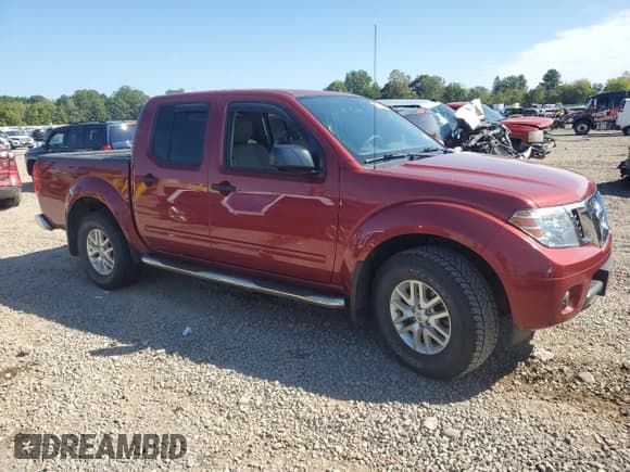 ✅ 2019 Nissan Frontier Pro-4X • VIN: 1N6AD0EV1KN718611 • Lot: 80743325. Listed on Copart with 69,156 mi. Free auction sales archive from the USA and detailed vehicle history report at DreamBid. Image 4.