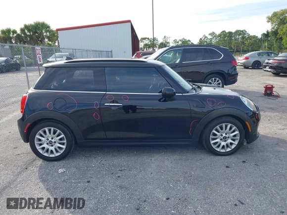 ✅ 2016 MINI Hardtop • VIN: WMWXP5C58G2D14749 • Lot: 43659236. Listed on IAAI with 92,614 mi. Free auction sales archive from the USA and detailed vehicle history report at DreamBid. Image 13.