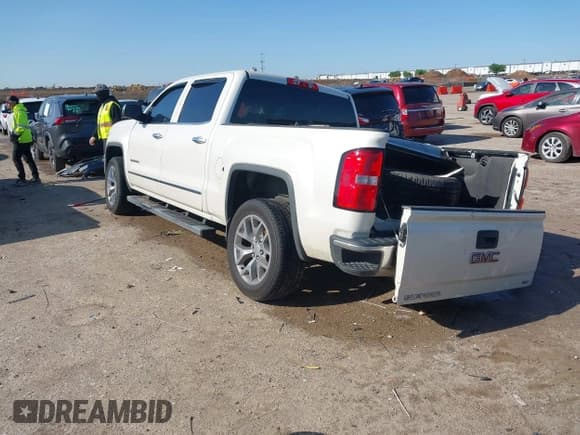 ✅ 2014 GMC Sierra 1500 SLT • VIN: 3GTP1VEC5EG486951 • Лот: 41939376. Опубликован ранее на IAAI с пробегом 131 857 миль. Бесплатный доступ к архиву аукционных продаж из США и подробный отчёт об истории автомобиля на DreamBid. Изображение 3.