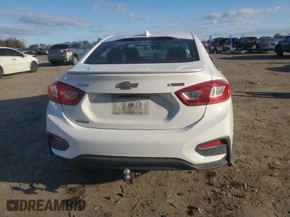 ✅ 2016 Chevrolet Cruze Premier • VIN: 1G1BG5SM9G7290993 • Lot: 89860365. Wystawiony na Copart z przebiegiem 136 118 mil. Bezpłatny archiwum sprzedaży aukcyjnych z USA i szczegółowy raport historii pojazdu na DreamBid. Zdjęcie 6.