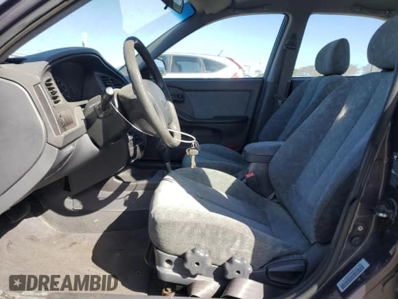 ✅ 2002 Hyundai Elantra GLS • VIN: KMHDN45D82U357052 • Lot: 47667365. Wystawiony na Copart z przebiegiem 114 868 mil. Bezpłatny archiwum sprzedaży aukcyjnych z USA i szczegółowy raport historii pojazdu na DreamBid. Zdjęcie 7.