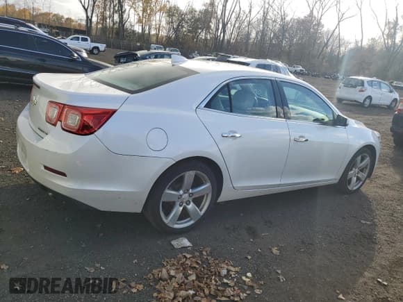 ✅ 2015 Chevrolet Malibu LTZ • VIN: 1G11G5SXXFF320528 • Lot: 90014615. Listed on Copart with 95,165 mi. Free auction sales archive from the USA and detailed vehicle history report at DreamBid. Image 3.