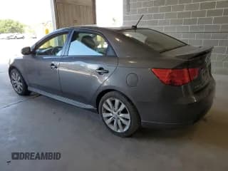 ✅ 2013 Kia Forte SX • VIN: KNAFW4A30D5692467 • Lot: 84024545. Listed on Copart with 143,758 mi. Free auction sales archive from the USA and detailed vehicle history report at DreamBid. Image 2.