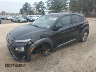 ✅ 2021 Hyundai Kona Ultimate • VIN: KM8K53AG8MU130013 • Лот: 81072285. Опубликован ранее на Copart с пробегом 101 779 миль. Бесплатный доступ к архиву аукционных продаж из США и подробный отчёт об истории автомобиля на DreamBid. Изображение 1.
