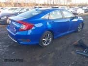 ✅ 2019 Honda Civic EX • VIN: 19XFC1F31KE204289 • Lot: 43761501. Listed on IAAI with 65,012 mi. Free auction sales archive from the USA and detailed vehicle history report at DreamBid. Image 4.
