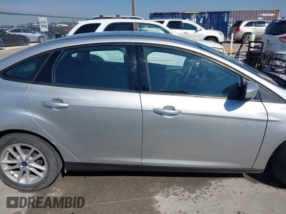 ✅ 2018 Ford Focus SE • VIN: 1FADP3F29JL273306 • Lot: 43341747. Listed on IAAI with 110,359 mi. Free auction sales archive from the USA and detailed vehicle history report at DreamBid. Image 13.