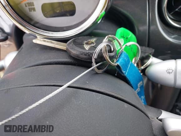 ✅ 2007 MINI Convertible S • VIN: WMWRH33597TL95200 • Lot: 42665233. Listed on IAAI with 76,917 mi. Free auction sales archive from the USA and detailed vehicle history report at DreamBid. Image 11.