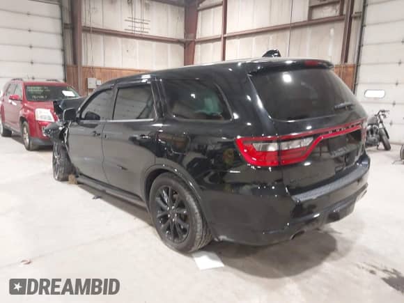 2017 Dodge Durango R/T with VIN 1C4SDJCT9HC945581, listed as a IAAI auction lot 43420044 with 143,365 mi miles and . Bid and sale history available at DreamBid. Image 3.