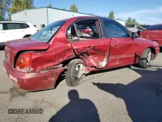 2005 Hyundai Elantra GLS z VIN KMHDN46D15U145015, wystawiony jako Copart lot #75775164 z przebiegiem 195 676 mil mil oraz Szkoda całkowita • Salvage title. Historia ofert i sprzedaży dostępna na DreamBid. Obrazek 3.