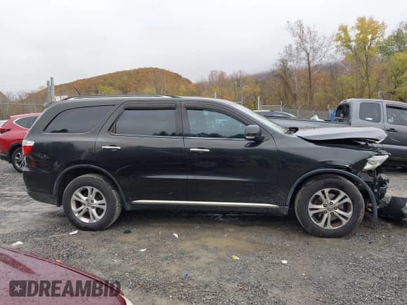 ✅ 2013 Dodge Durango Crew • VIN: 1C4RDJDG2DC530631 • Lot: 43540833. Listed on IAAI with 194,649 mi. Free auction sales archive from the USA and detailed vehicle history report at DreamBid. Image 13.